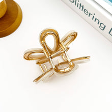 Load image into Gallery viewer, Metal Hollow White Flower Claw Clip