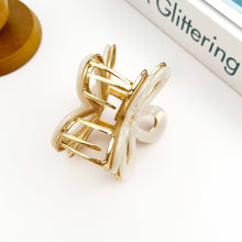 Load image into Gallery viewer, Metal Hollow White Flower Claw Clip